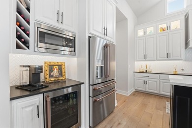 Almost new and lightly lived in, this custom-built home offers on Shadow Glen Golf Club in Kansas - for sale on GolfHomes.com, golf home, golf lot