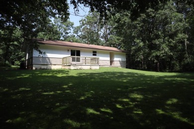 Welcome to 606 Dove Ln, a delightful traditional-style home on The Course At Turkey Mountain in Arkansas - for sale on GolfHomes.com, golf home, golf lot