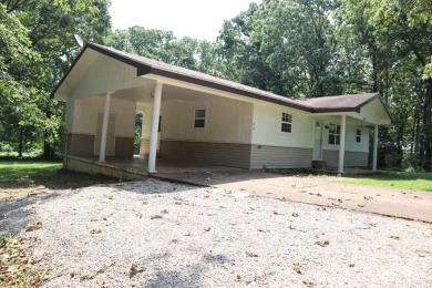 Welcome to 606 Dove Ln, a delightful traditional-style home on The Course At Turkey Mountain in Arkansas - for sale on GolfHomes.com, golf home, golf lot