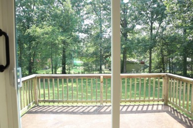 Welcome to 606 Dove Ln, a delightful traditional-style home on The Course At Turkey Mountain in Arkansas - for sale on GolfHomes.com, golf home, golf lot