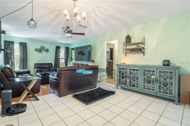 Welcome to this stunning 3-bedroom, 2-bathroom home with over 2 on The Grand Club - Pine Lakes Course in Florida - for sale on GolfHomes.com, golf home, golf lot