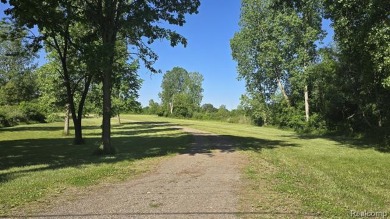 20+ acres of  prime, buildable land located less than 1 mile on Hudson Mills Metropark Golf Course in Michigan - for sale on GolfHomes.com, golf home, golf lot