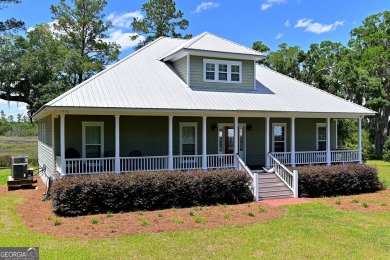 Welcome to this impeccably maintained 4-bed, 3-bath home w/ on Sapelo Hammock Golf Club in Georgia - for sale on GolfHomes.com, golf home, golf lot