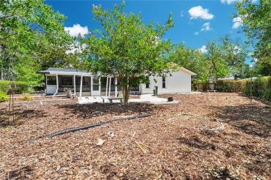 Welcome to this stunning 3-bedroom, 2-bathroom home with over 2 on The Grand Club - Pine Lakes Course in Florida - for sale on GolfHomes.com, golf home, golf lot