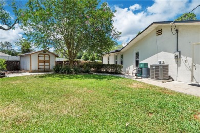 Welcome to this stunning 3-bedroom, 2-bathroom home with over 2 on The Grand Club - Pine Lakes Course in Florida - for sale on GolfHomes.com, golf home, golf lot