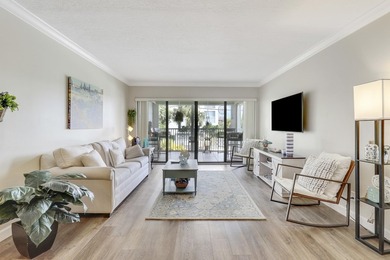 Wake up to serene marina views from your own patio in the heart on North Palm Beach Country Club in Florida - for sale on GolfHomes.com, golf home, golf lot