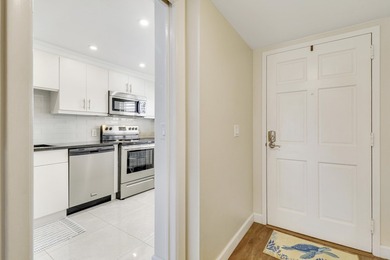 Wake up to serene marina views from your own patio in the heart on North Palm Beach Country Club in Florida - for sale on GolfHomes.com, golf home, golf lot