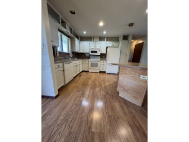 This well-kept split-level home in Winner, SD offers 1,044 sq ft on Winner Country Club in South Dakota - for sale on GolfHomes.com, golf home, golf lot