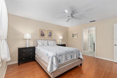 Nestled on a desirable corner homesite shaded by majestic live on Hacienda Hills Golf and Country Club in Florida - for sale on GolfHomes.com, golf home, golf lot