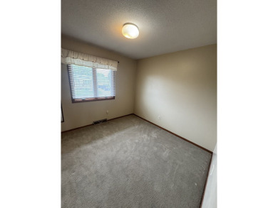 This well-kept split-level home in Winner, SD offers 1,044 sq ft on Winner Country Club in South Dakota - for sale on GolfHomes.com, golf home, golf lot
