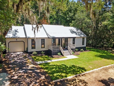 Nestled amidst the tranquil coastal beauty of Pawleys Island, SC on True Blue Plantation in South Carolina - for sale on GolfHomes.com, golf home, golf lot