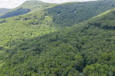 Discover an exceptional opportunity to build a mountain retreat on Sapphire National Golf Club in North Carolina - for sale on GolfHomes.com, golf home, golf lot