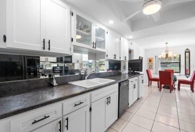 Welcome to this spacious 2-bedroom, 2-bath home with over 1,800 on Falcon Watch Golf Club in Florida - for sale on GolfHomes.com, golf home, golf lot
