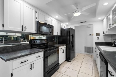 Welcome to this spacious 2-bedroom, 2-bath home with over 1,800 on Falcon Watch Golf Club in Florida - for sale on GolfHomes.com, golf home, golf lot