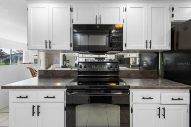 Welcome to this spacious 2-bedroom, 2-bath home with over 1,800 on Falcon Watch Golf Club in Florida - for sale on GolfHomes.com, golf home, golf lot