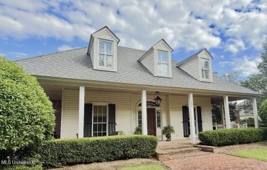 A southern dream on the 18th hole with breath taking waterfront on Lake Caroline Golf Club in Mississippi - for sale on GolfHomes.com, golf home, golf lot