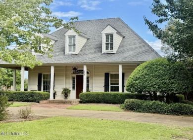 A southern dream on the 18th hole with breath taking waterfront on Lake Caroline Golf Club in Mississippi - for sale on GolfHomes.com, golf home, golf lot
