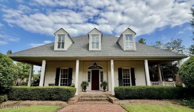 A southern dream on the 18th hole with breath taking waterfront on Lake Caroline Golf Club in Mississippi - for sale on GolfHomes.com, golf home, golf lot
