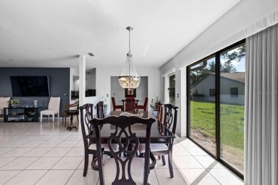 Welcome to this spacious 2-bedroom, 2-bath home with over 1,800 on Falcon Watch Golf Club in Florida - for sale on GolfHomes.com, golf home, golf lot