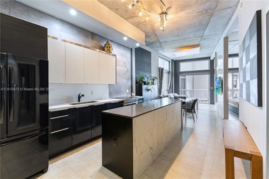 Oversized 1-bedroom loft-style condo (802 SF) at The Meridian on Miami Beach Golf Club in Florida - for sale on GolfHomes.com, golf home, golf lot