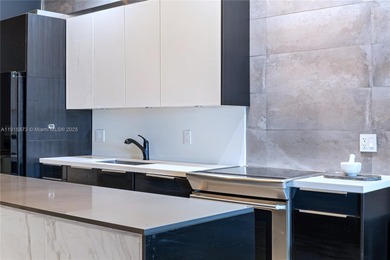 Oversized 1-bedroom loft-style condo (802 SF) at The Meridian on Miami Beach Golf Club in Florida - for sale on GolfHomes.com, golf home, golf lot