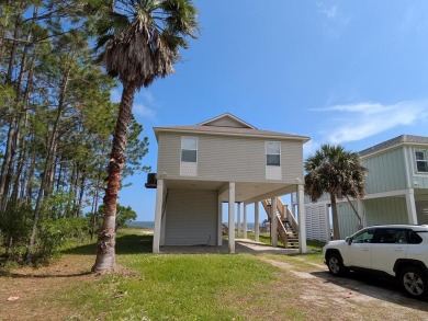 Enjoy the best of bayside living in this beautifully furnished on Quail Heights Golf and Country Club in Florida - for sale on GolfHomes.com, golf home, golf lot
