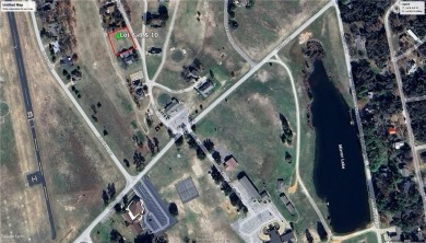 Golf coarse lot {actually 3 lots} with 140' of paved road on Hilltop Lakes Resort Golf Club in Texas - for sale on GolfHomes.com, golf home, golf lot