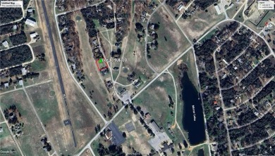 Golf coarse lot {actually 3 lots} with 140' of paved road on Hilltop Lakes Resort Golf Club in Texas - for sale on GolfHomes.com, golf home, golf lot