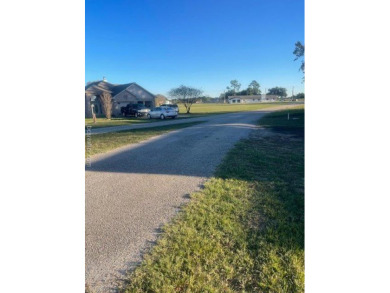 Golf coarse lot {actually 3 lots} with 140' of paved road on Hilltop Lakes Resort Golf Club in Texas - for sale on GolfHomes.com, golf home, golf lot