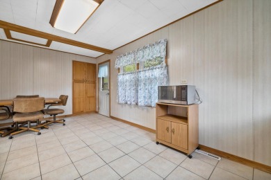 First time offered on the market! Check out this charming on Geneva National Golf Club in Wisconsin - for sale on GolfHomes.com, golf home, golf lot