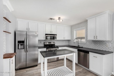 Contemporary two-story home offering 4 bedrooms and 2.5 baths on The Duke At Rancho El Dorado Golf Course in Arizona - for sale on GolfHomes.com, golf home, golf lot