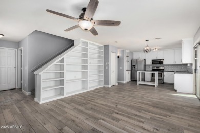 Contemporary two-story home offering 4 bedrooms and 2.5 baths on The Duke At Rancho El Dorado Golf Course in Arizona - for sale on GolfHomes.com, golf home, golf lot