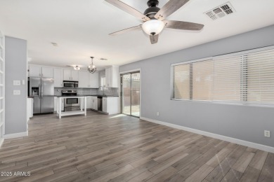 Contemporary two-story home offering 4 bedrooms and 2.5 baths on The Duke At Rancho El Dorado Golf Course in Arizona - for sale on GolfHomes.com, golf home, golf lot