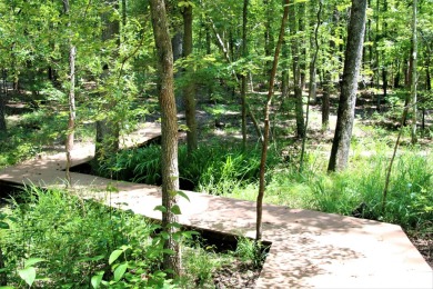 A lovely well-treed 0.59 acre home site in the amenities on The Golf Club At Cedar Creek in South Carolina - for sale on GolfHomes.com, golf home, golf lot