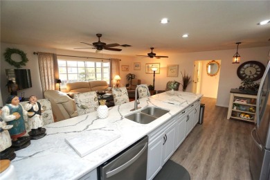Under contract-accepting backup offers. This home looks better on Twin Isles Country Club in Florida - for sale on GolfHomes.com, golf home, golf lot