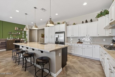 Nestled on a serene mountainside cul-de-sac in the highly on Estrella Mountain Ranch Golf Course in Arizona - for sale on GolfHomes.com, golf home, golf lot