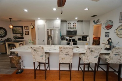 Under contract-accepting backup offers. This home looks better on Twin Isles Country Club in Florida - for sale on GolfHomes.com, golf home, golf lot