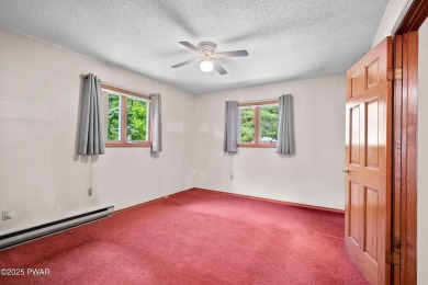 Welcome to this spacious 5-bedroom, 2-bathroom gem nestled in on The Hideout Golf in Pennsylvania - for sale on GolfHomes.com, golf home, golf lot