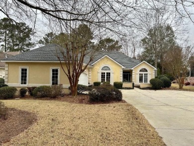 This well maintained home offers a charming courtyard entrance on Woodside Plantation Country Club in South Carolina - for sale on GolfHomes.com, golf home, golf lot