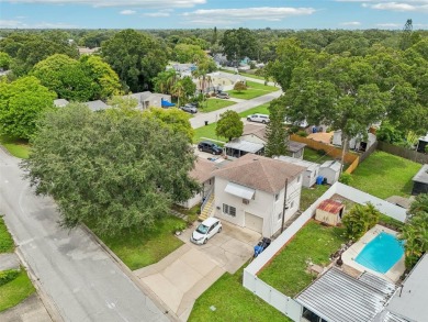 Under contract-accepting backup offers. Unique on Mangrove Bay Golf Course in Florida - for sale on GolfHomes.com, golf home, golf lot