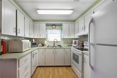 Cute and sassy - this may just be the one you need.  This home on Maple Leaf Golf and Country Club in Florida - for sale on GolfHomes.com, golf home, golf lot