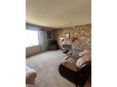 Check out this super cute home located in the heart of Carroll on Carroll Municipal Golf Course in Iowa - for sale on GolfHomes.com, golf home, golf lot