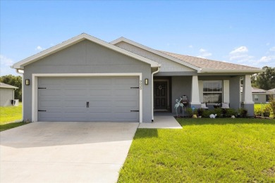 Welcome to 9020 SE 42nd Court--an inviting 3-bedroom, 2-bathroom on Baseline Golf Course in Florida - for sale on GolfHomes.com, golf home, golf lot