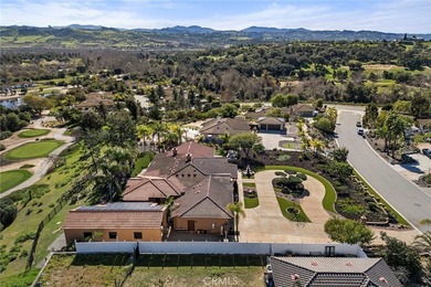 EXCEPTIONAL SEMI-CUSTOM SINGLE-STORY that is breathtaking! Set on Pala Mesa Resort in California - for sale on GolfHomes.com, golf home, golf lot