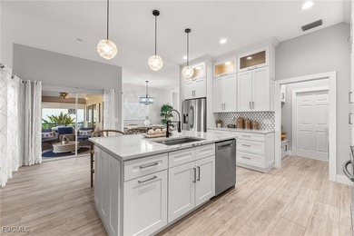 THIS IS LUXURY LIVING IN GATEWAY ! RENOVATED 4 BEDROOM AND 3 on Gateway Golf and Country Club in Florida - for sale on GolfHomes.com, golf home, golf lot