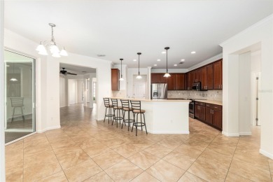 Enjoy the serenity and ease of resort-style living in this on Stone Creek Golf Club in Florida - for sale on GolfHomes.com, golf home, golf lot