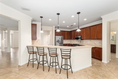 Enjoy the serenity and ease of resort-style living in this on Stone Creek Golf Club in Florida - for sale on GolfHomes.com, golf home, golf lot