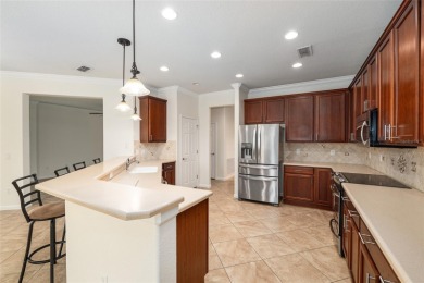 Enjoy the serenity and ease of resort-style living in this on Stone Creek Golf Club in Florida - for sale on GolfHomes.com, golf home, golf lot