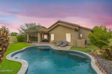 Welcome home to Desert Sage Drive, where Arizona evenings glow on Estrella Mountain Ranch Golf Course in Arizona - for sale on GolfHomes.com, golf home, golf lot