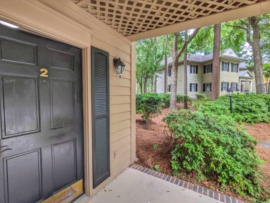 Well maintained 1st floor, end unit condo located on the 10th on Pawleys Plantation Golf and Country Club in South Carolina - for sale on GolfHomes.com, golf home, golf lot